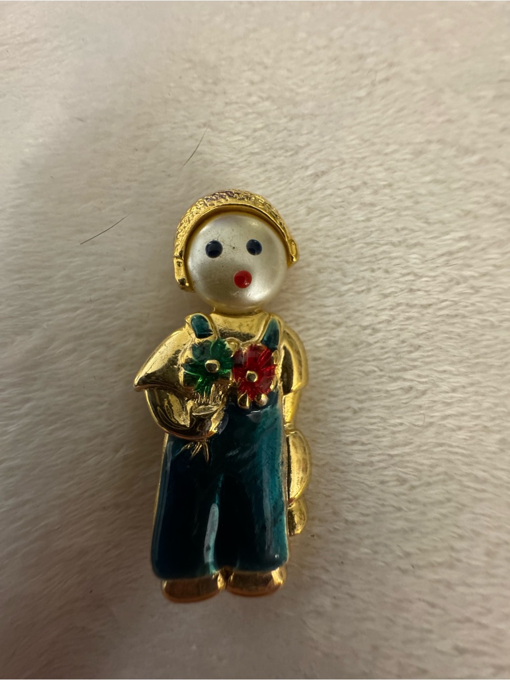 Gold-Tone Enamel boy Brooch with Blue overalls and Floral Accents